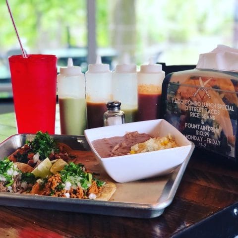 Image of three delicious tacos served with rice, beans, and a beverage, representing Atwater Street Tacos' 3 Taco Lunch Combo.